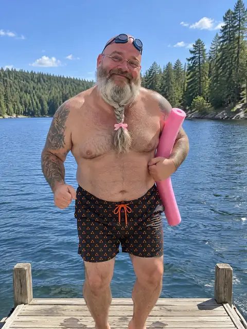 Big Randy wearing the Monogram Swim Trunks